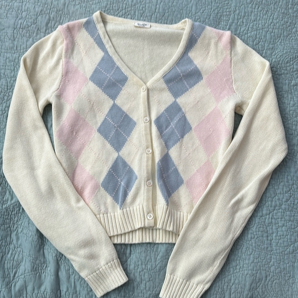 John Galt cardigan style sweater.